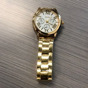 Gold Geneva watch